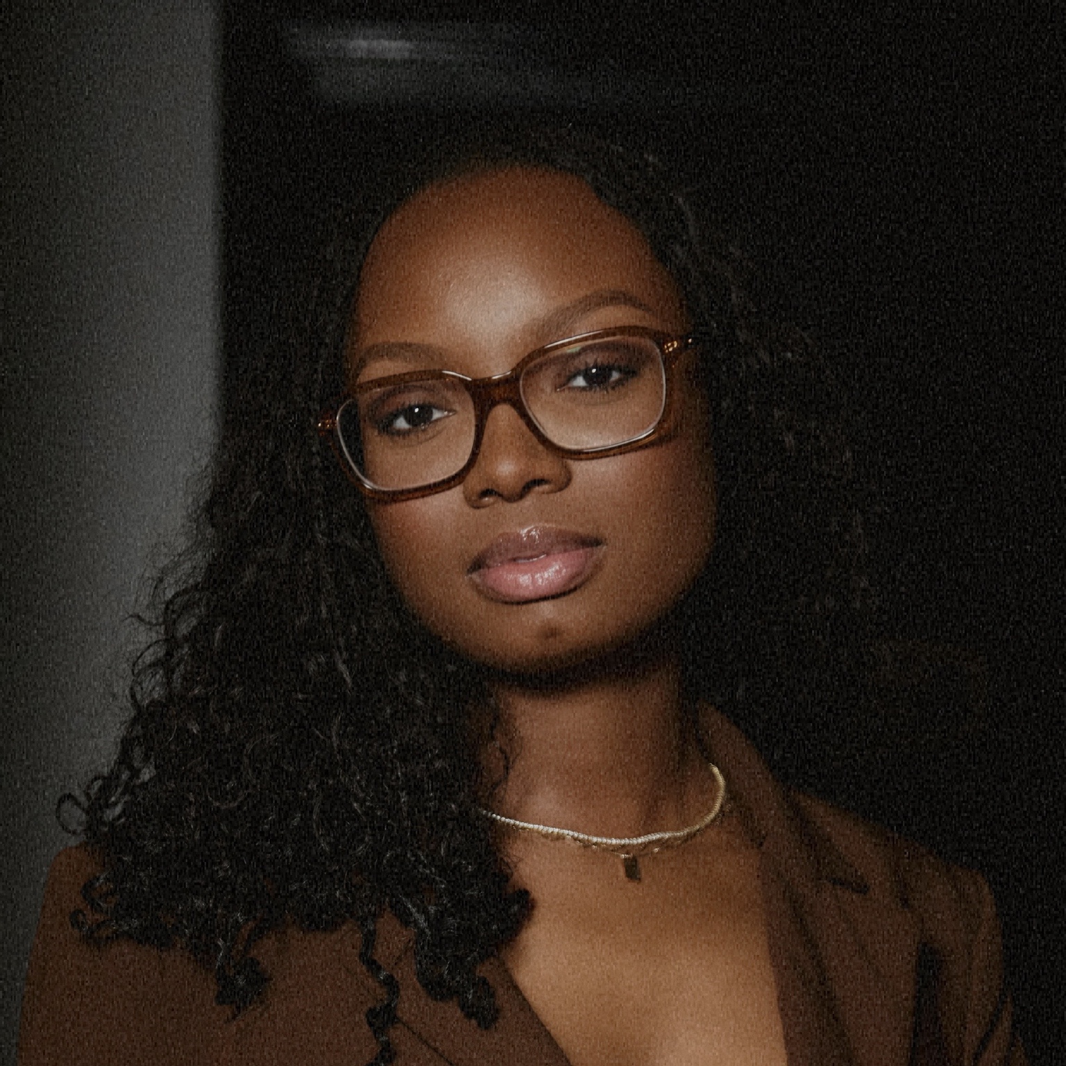 Professional headshot of Kiona Wilson